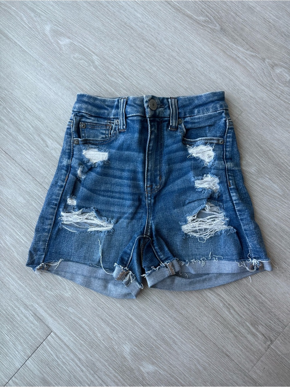 American Eagle Curvy High Rise Distressed Mid Blue Denim Shorts